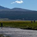 Keith and Rob follow Mark across the river Glentanner